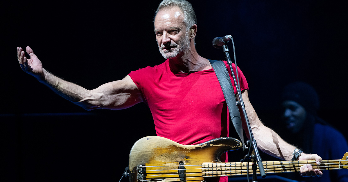 Sting holding his guitar