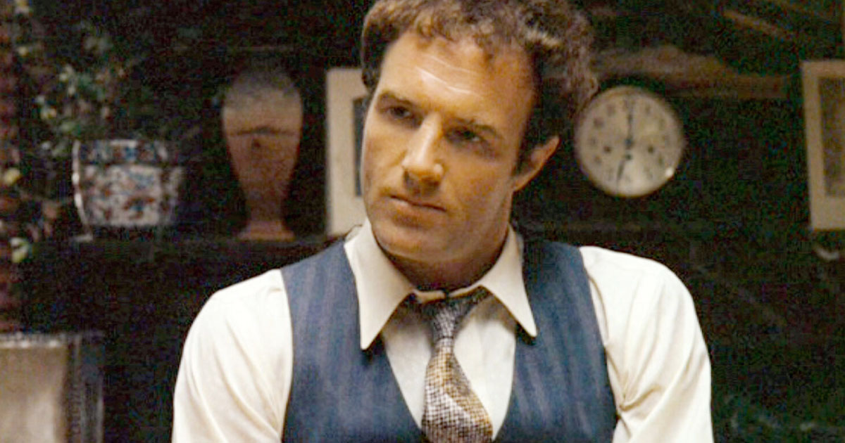 James Caan in a suit and tie