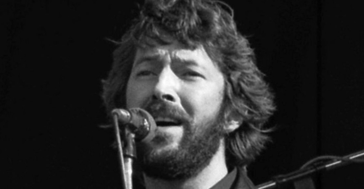 Grayscale Portrait Photo of Eric Clapton performing in Amsterdam June 23