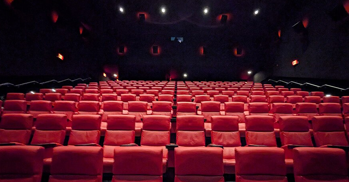 empty movie theatre red seats