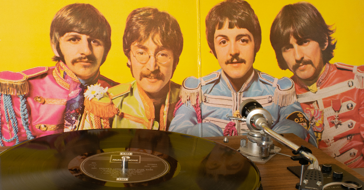 Playing Sgt Pepper's Lonely Hearts Club Band vinyl record by the Beatles on a direct drive record player.