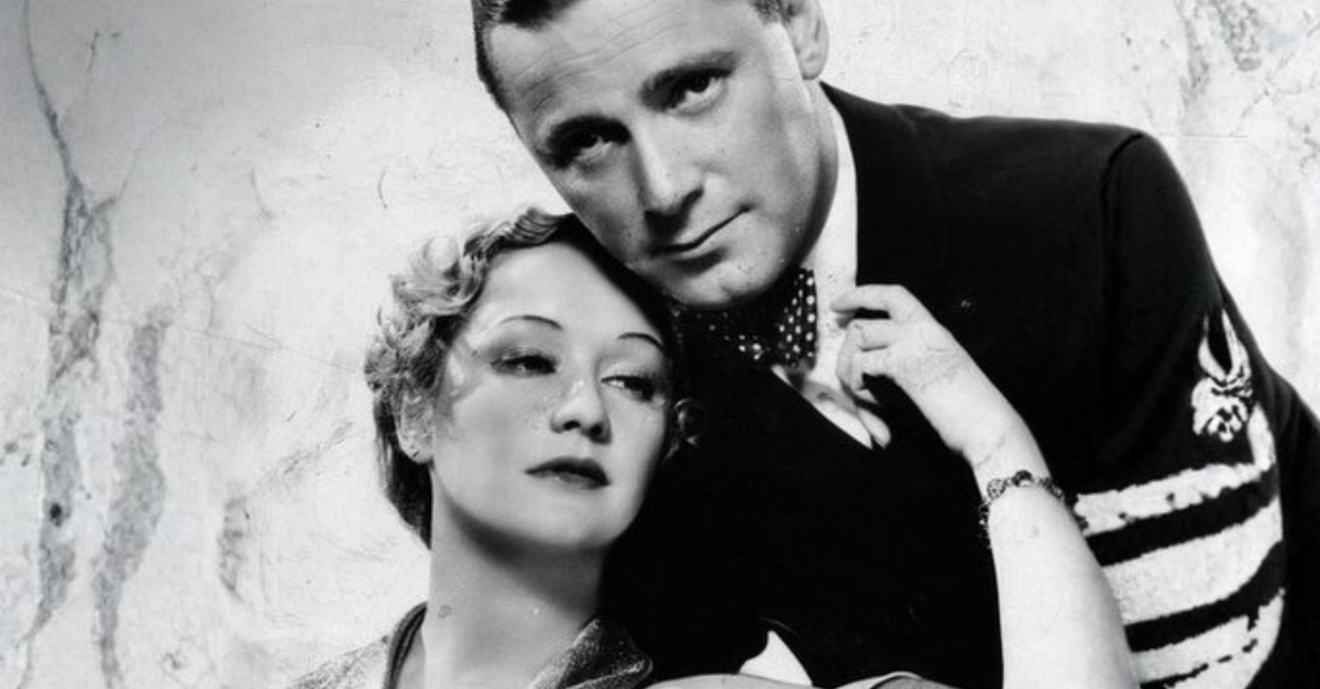 Publicity photo of actors Herbert Marshall and Miriam Hopkins, intended to promote the 1932 film, Trouble in Paradise