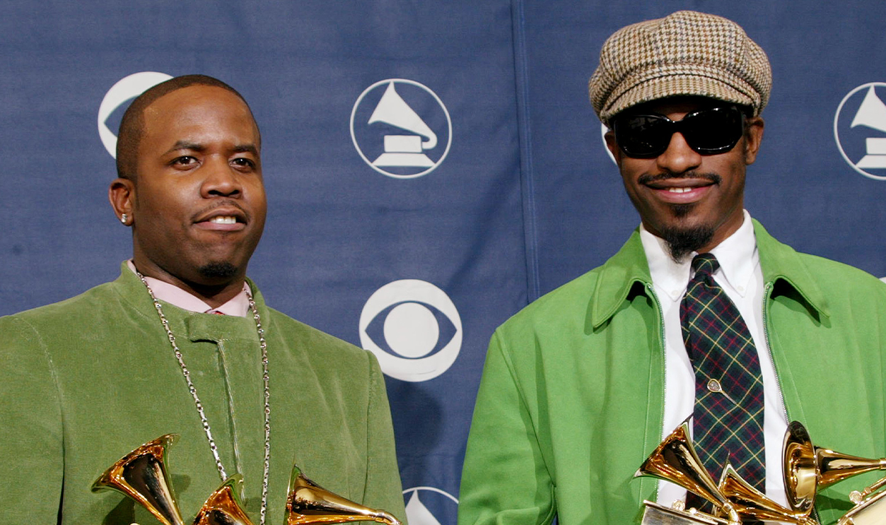 Musical Artists Big Boi (left) and Andre 3000 of Oukast pose with their six Grammys backstage in the Pressroom at the 46th Annual Grammy Awards.