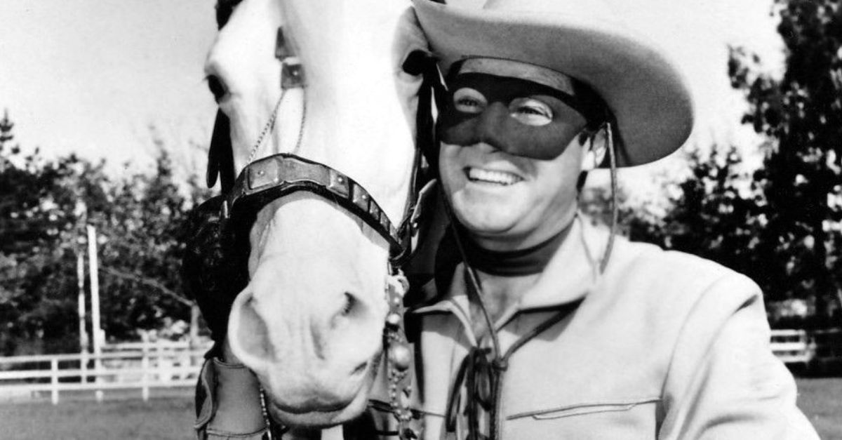 Photo of Clayton Moore as the Lone Ranger and Silver.