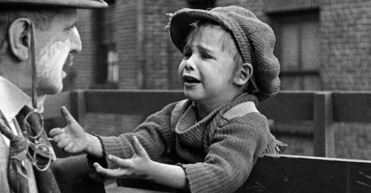 Frank Campeau (the man) and Jackie Coogan (child) in The Kid (1921).
