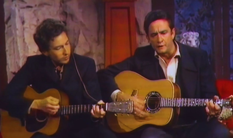 When critics turned on Bob Dylan, Johnny Cash stood beside him—and ...