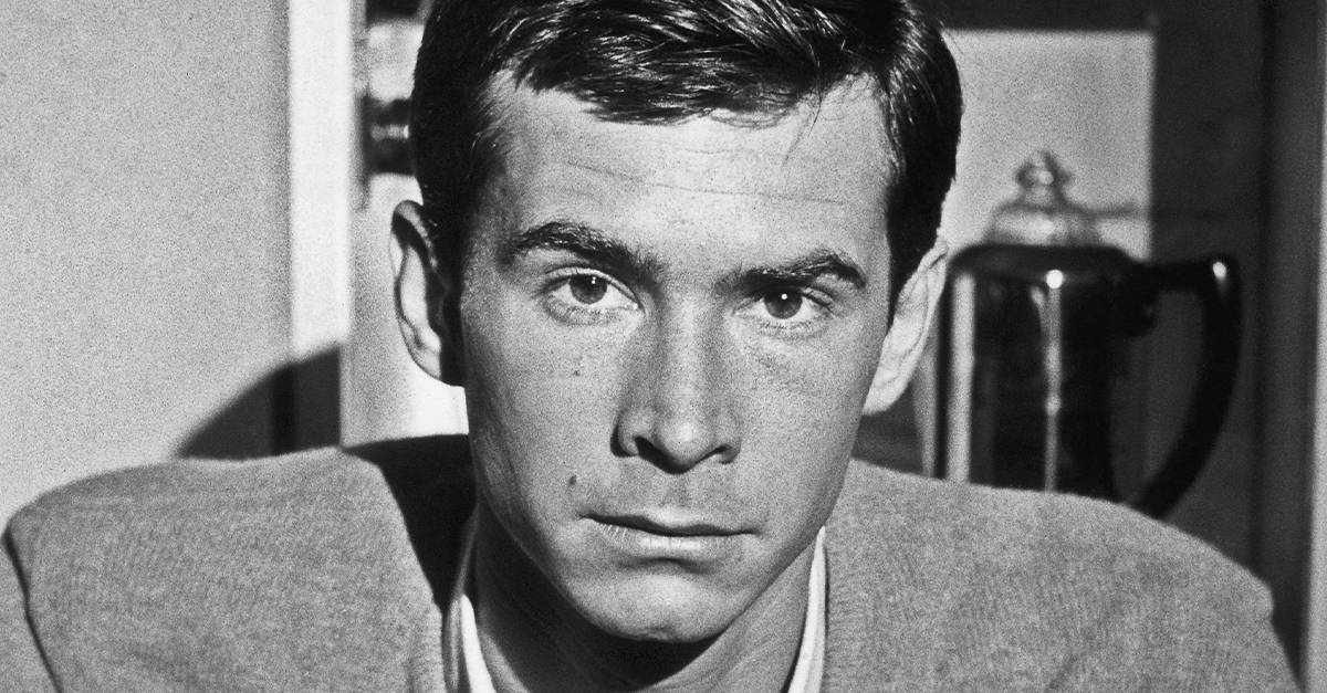Photo of Anthony Perkins, looking serious.