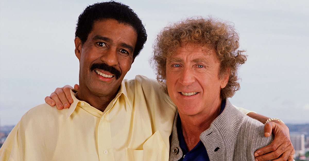 Actor comedians Richard Pryor (left) and Gene Wilder pose together during a 1989 photo portrait session in Hollywood, California