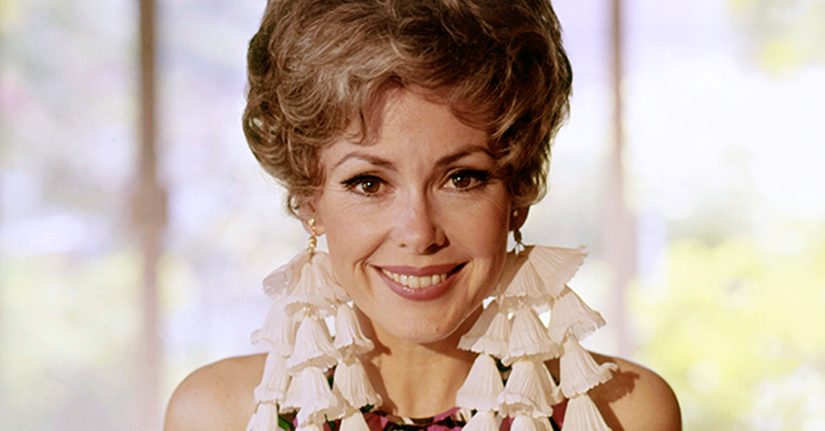 Barbara Rush smiling wearing colorful dress circa 1965