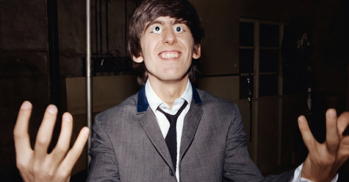 George Harrison tries out a pair of false eyes made by Madame Tussaud's waxwork