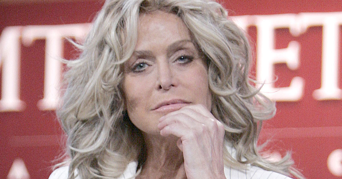 Farrah Fawcett wearing a white blouse