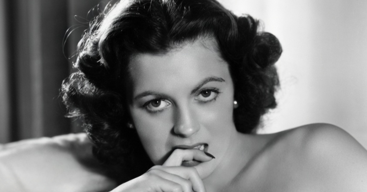 Actress Faith Domergue Biting Finger
