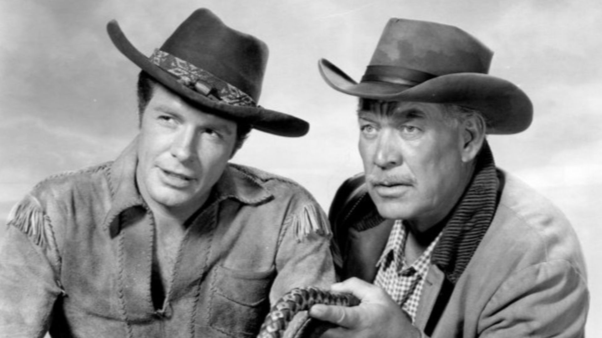 Photo of Robert Horton as Flint McCullough and Ward Bond as Seth Adams from the television program Wagon Train. McCullough's role was that of the wagon train's scout while Adams was its wagonmaster.