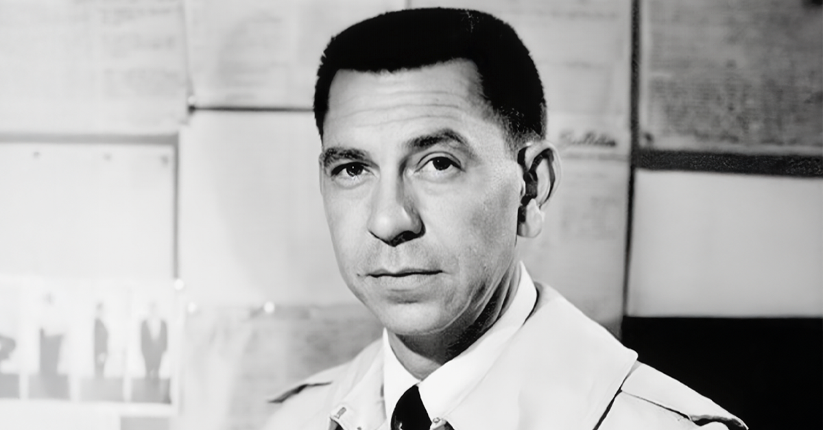 Jack Webb as Sergeant Joe Friday from the television series Dragnet.