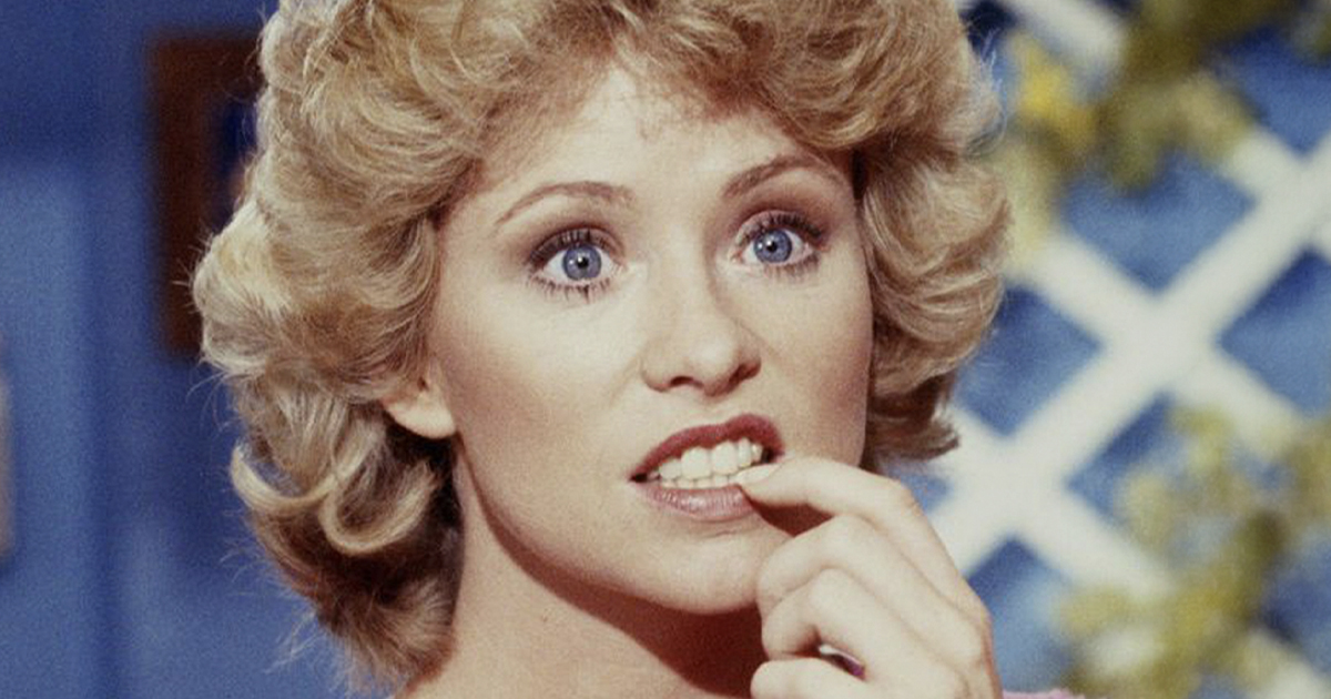 Lauren Tewes with blonde curly hair