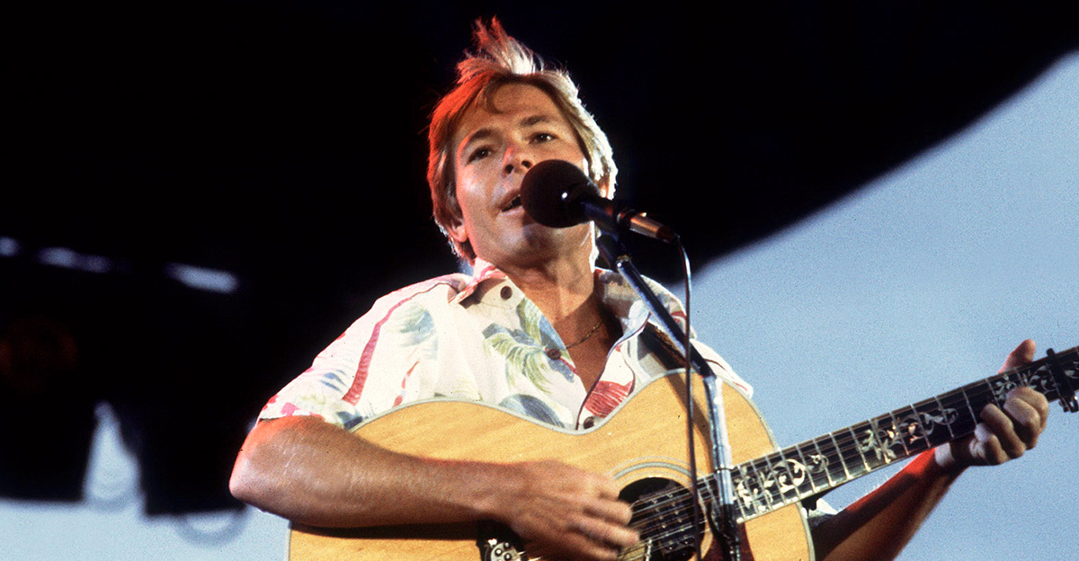 John Denver On Stage American musician John Denver (1943 - 1997) performs on stage at Chicagofest, Chicago, Illinois, August 9, 1982.