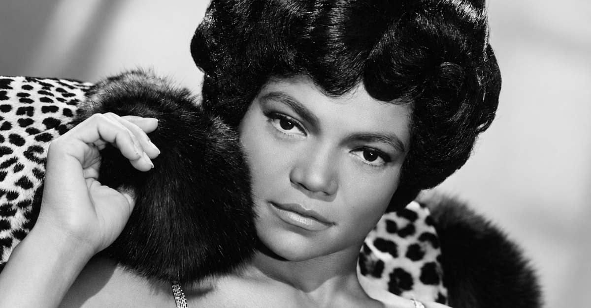American singer and actress Eartha Kitt decked in leopard skin and furs for her London stage show 'Talk of the Town', 9th September 1960